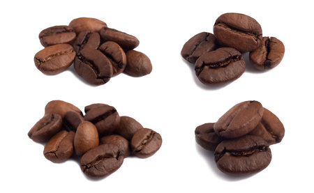 Various options for piles of several roasted arabica coffee beans side view with a large bokeh in daylight, macrophotographyの写真素材