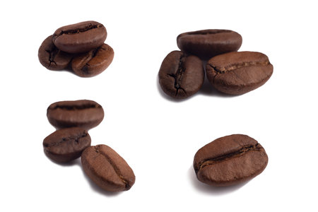Various options for piles of several three roasted arabica coffee beans and one bean too, side view with a large bokeh in daylight, macrophotographyの写真素材