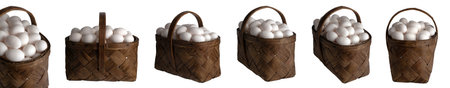 Old Russian wicker basket made of birch with white chicken eggs in various angles in hard daylight, in full viewの写真素材
