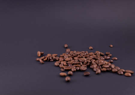 scattered coffee on a dark background