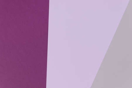 An abstract background made of gray, violet and lilac lines overlapping each other