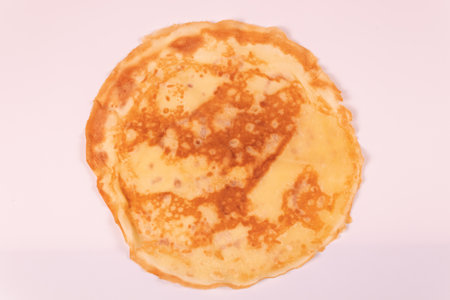 yellow pancake with spots back viewの写真素材