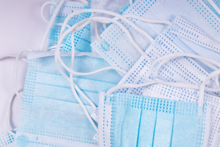 any blue medical masks and ribbons from them