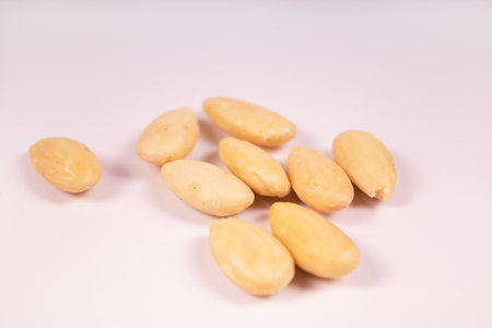 nine peeled almonds in the center of the frameの写真素材