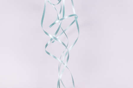 blue ribbon is randomly intertwined