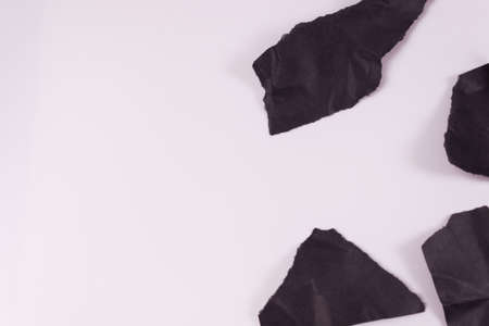 on the right side of the frame, four-fifths of a piece of black paperの写真素材