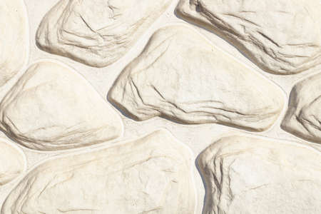 white stones form a pattern, and repeat the bends of each other