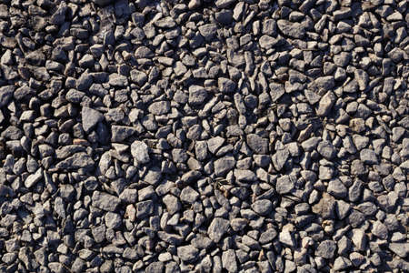 small gray stones completely cover the ground