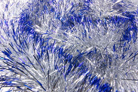 The texture on the entire frame of the Christmas tinsel blue