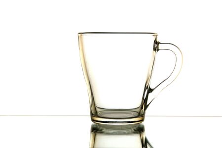 glass tea cup is isolated on a white backgroundの写真素材