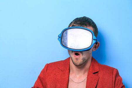 Close up of a funny young man. The collage of young man with different emotion. emotional card.の写真素材