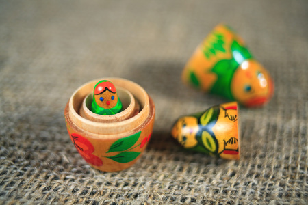 Russian dolls. Matryoshka on linen fabric for the background.の写真素材