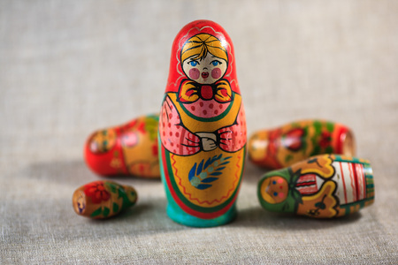 Russian dolls. Matryoshka on linen fabric for the background.の写真素材