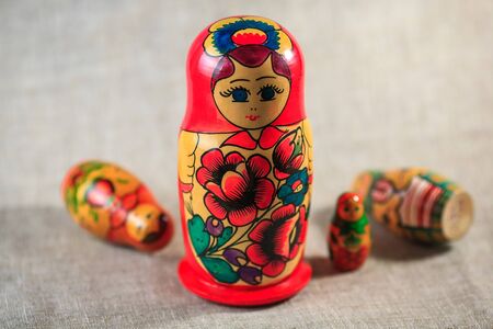 Russian dolls. Matryoshka on linen fabric for the background.の写真素材