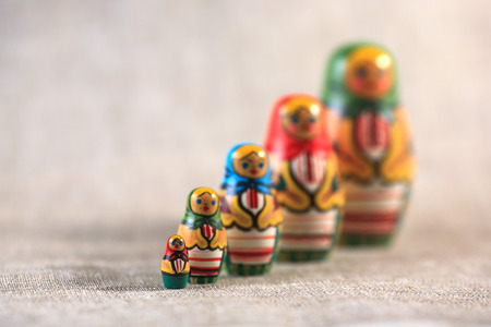 Russian dolls. Matryoshka on linen fabric for the background.の写真素材