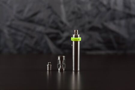Parts of e-cigarette. Electronic nicotine delivery systems. ENDS. Rebuildable dripping atomizer (RDA).の写真素材