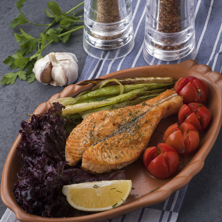 Grilled salmon fillet with baked vegetables. Closeupの写真素材
