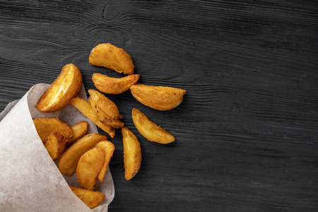 Baked fried potatoes with copyspace. Top viewの写真素材