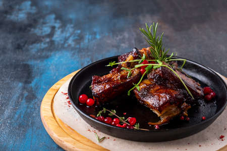 Juicy grilled pork ribs with barbeque sauce. Bbq pork ribs. Text space