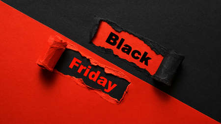 Black Friday text on torn paper. Black friday concept. Copy space. Top viewの写真素材