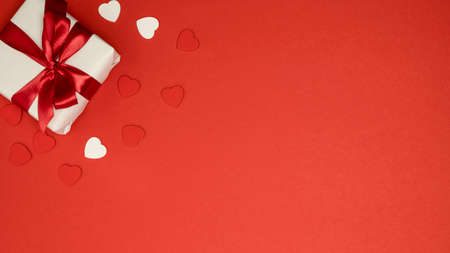Valentine's Day background with gift box and hearts. Holiday concept. Top view, copy spaceの写真素材