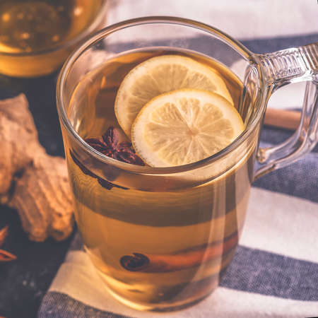 Hot tea with ginger, lemon and honey. Toned photoの写真素材