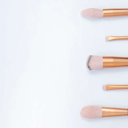 Makeup brushes on white background. Copy spaceの写真素材