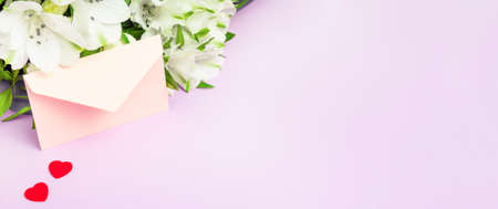 Celebration envelope on color background. Space for text. Bannerの写真素材