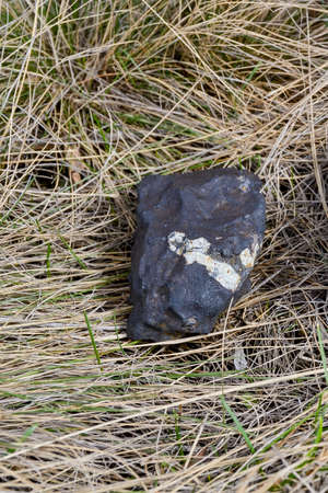 fragments of Chelyabinsk meteorite found in the winter and spring of 2013 near the city Chebarkulの写真素材