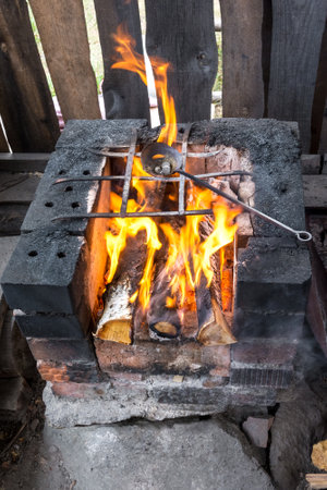Master class in blacksmithing at the forge of decorative craftsの写真素材