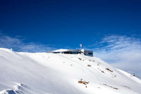 Sport ski base high in the alpine mountains on a sunny winter day in Innsbruckのeditorial素材