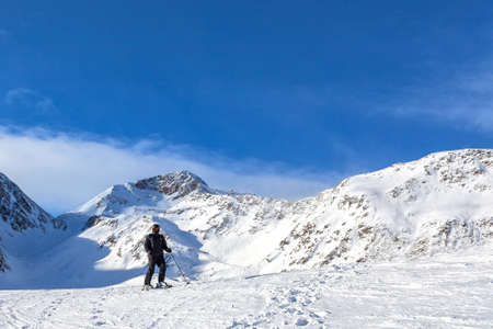 lonely skier in the endless Alps in Innsbruckのeditorial素材
