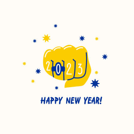 The hand is clenched into a fist with a ring on the finger. Happy New Year 2023. New Years...