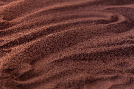 Ground coffee. Texture Background. Shallow depth of field