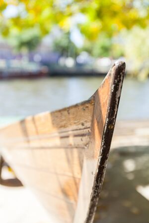 The bow of the old boat located on the banks of the river. Selective focusの写真素材