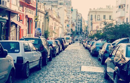BUENOS AIRES, ARGENTINA - MAY 6: Old narrow street is crowded with parked cars in Buenos Aires, Argentina. It is old center of capital cityのeditorial素材