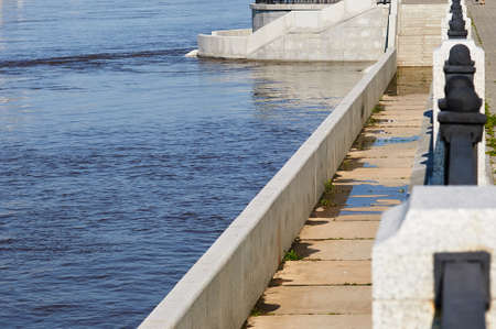 The beginning of flooding on the embankment of the city of Blagoveshchensk in June 2021.の写真素材