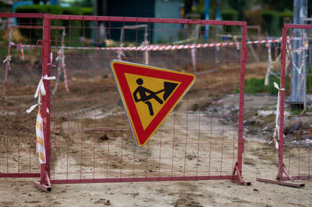 Roadworks sign on a temporary fence.の写真素材