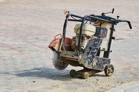 Asphalt road cutting machine. The process of building a new road. Outdoor work.の写真素材
