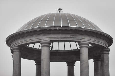 Transparent dome of the marble rotunda. Black and white image. Signs of the cardinal points on the roof.の写真素材