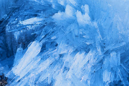 Melting river ice. Columnar and needle-like structure of crystals. Ice floe in the spring on the...