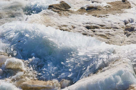 Ice on the river in spring on a sunny day. Texture from fragments of ice floes.の写真素材