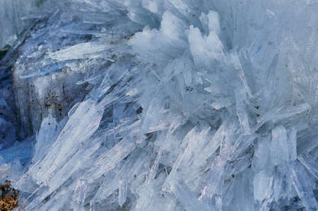 A group of shards of ice with glare from the sun.の写真素材