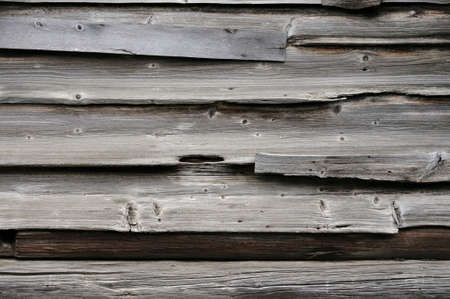 Shabby wooden logs texture. Old wood fence, barn surface. Hardwood weathered grunge oak wall. Dark...