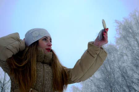 beautiful girl in winter hatの写真素材