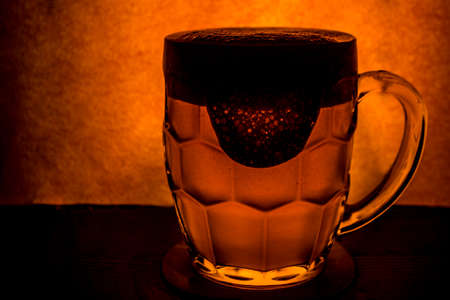 mug with beer on a beautiful backgroundの写真素材