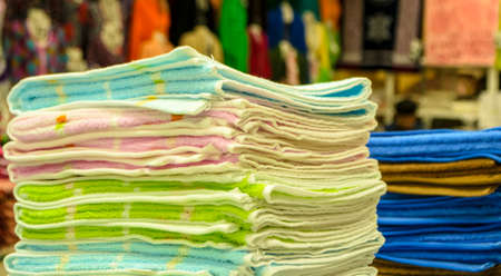 A stack of towels in the storeの写真素材