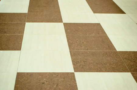 Tiles of different colors on the floorの写真素材