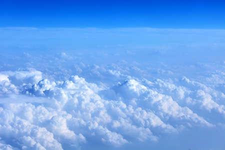 Clouds from above. View from airplane in sunny weather