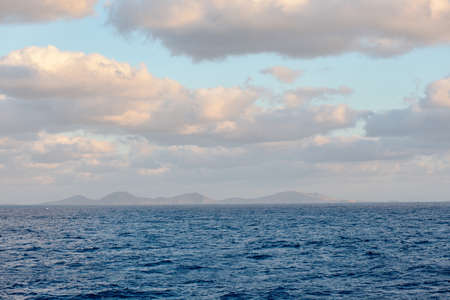 distant island, sea and sky aerial viewの写真素材